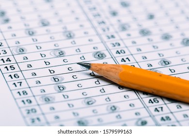 A Pencil Sitting On A Test Bubble Sheet