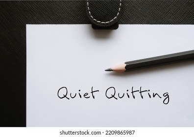 Pencil Writing On White Paper  QUIET QUITTING, Concept Of Quitting Idea Of Workers Going Above And Beyond At Work, Doing Exactly What The Job Calls For And Nothing More