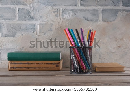 Pencilcase, pencils and books