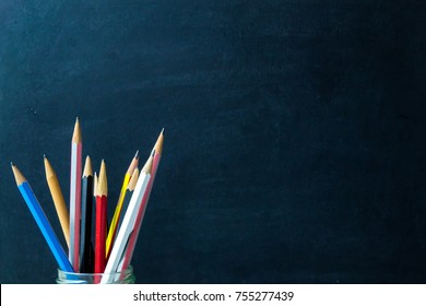 Pencils with chalkboard background. Education concept. - Shutterstock ID 755277439