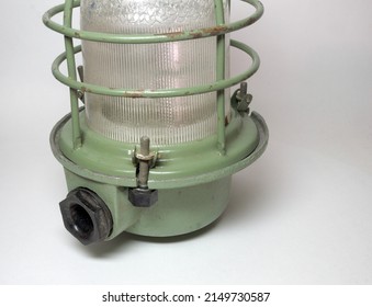 pendant miners lamp with protective cage. moisture proof bushing for power cable and fixing threader rod with plastic handle, closeup