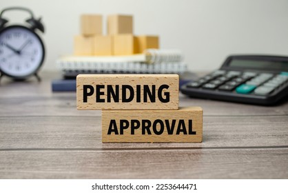 pending approval is shown on a conceptual photo using wooden blocks - Shutterstock ID 2253644471