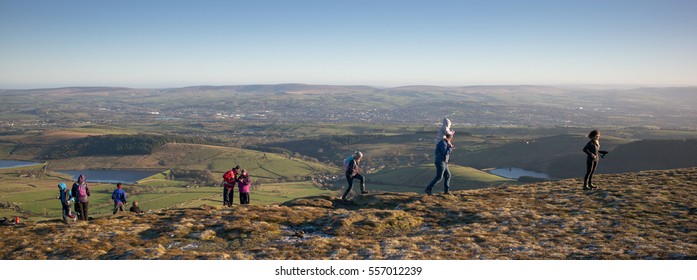 PENDLE HILL, LANCASHIRE/UK – JANUARY 2, 2017: Families On Top Of Pendle Hill On Winter Bank Holiday, Lancashire, UK