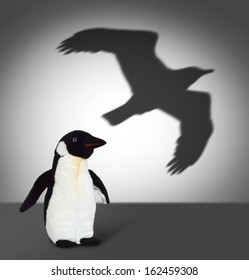 Penguin with eagle shadow. Concept graphic