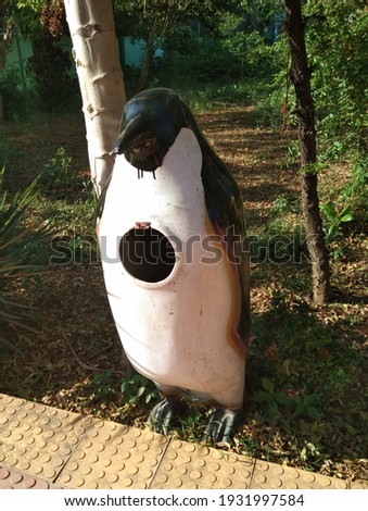 Penguin shaped dustbin or wastebin