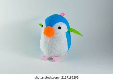 Penguin.a Soft Toy On A White Background.