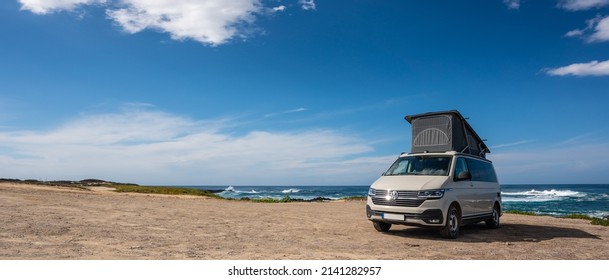 Peniche, Portugal - March 12 2022: The new 2021 Volkswagen VW Transporter Camping Van T6.1 California Ocean in the coastal Nature 