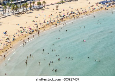 PENISCOLA, SPAIN - JULY 28, 2016: Aerial View Of People Having Fun And Relaxing In Peniscola Beach Resort At Mediterranean Sea In Spain.