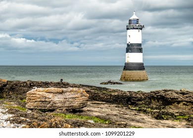 The Penmon point lighthouse is located close to Puffin Island on Anglesey, Wales - United Kingdom.