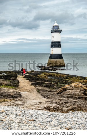 The Penmon point lighthouse is located close to Puffin Island on Anglesey, Wales - United Kingdom.