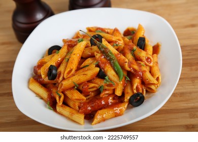 Penne Arrabiata Pasta With Olive And Sauce Served In A Dish Isolated On Table Side View Of Middle East Food