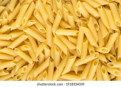 Lot of penne macaroni background texture. - Powered by Shutterstock