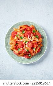 Penne Pasta With Chicken, Tomato Sauce And Parsley Leaves, Overhead Flat Lay Shot With Copy Space