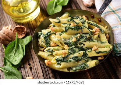 Penne Pasta With Spinach, Gorgonzola Cheese And Walnuts