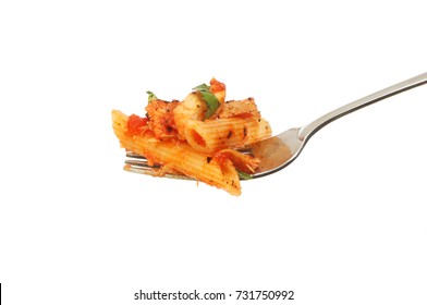 Penne Pasta With Tomato, Chicken And Basil Sauce On A Fork Isolated Against White