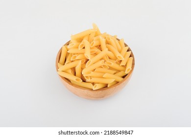 Penne Pasta In Wooden Bowl Side View