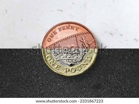 Pennies into Pounds. One half a penny and one half a pound, Money concept.