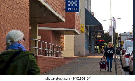 Penrith Police Station, Penrith, New South Wales, Australia With Two Women Walking In Opposite Directions Outside On The Pavement. Photo Taken  On 20 May 2019.                                