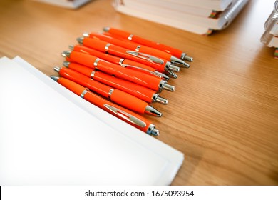 Pens and marketing advertising for business and company promotion, unfocused background and free space for text. - Shutterstock ID 1675093954