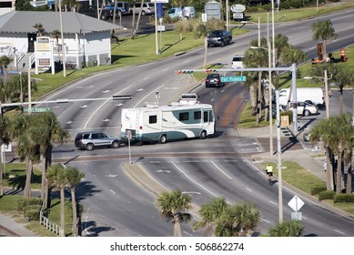 Pensacola Beach Florida USA - October 2016 - Overview Of A RV Towing A Car Over A Road Junction Controlled By A Traffic Light