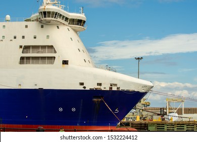 Pensacola, Florida/usa-october 15 2019: Tug Boat And Ship At The Dock With People Watching