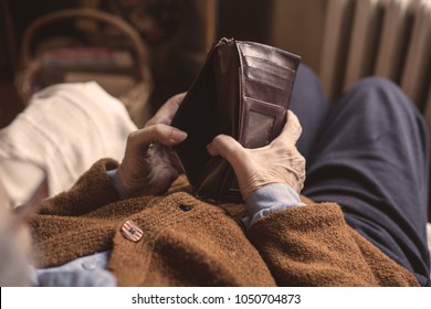 Pensioner Woman Holding Hands Wallet Without Money.