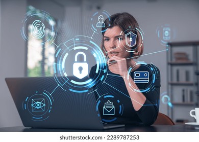 Pensive attractive beautiful businesswoman in formal wear working on laptop at office workplace in background. Concept of data protection information technology. lock icon hologram. - Shutterstock ID 2289787253