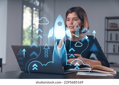 Pensive attractive beautiful businesswoman in formal wear working on laptop at office workplace in background. Concept of start up new business technology. Rocket icon hologram. Talking phone. - Powered by Shutterstock