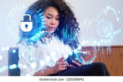 Pensive black businesswoman working with tablet, double exposure, stock market candlesticks and bar chart hud, forex diagrams with glowing security lock. Concept of financial strategy
