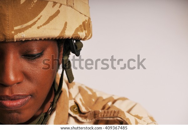 Pensive Black Female British\
Soldier