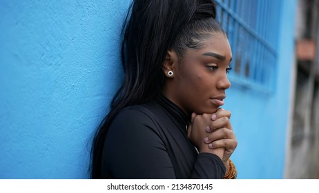 A Pensive Black Girl A Thoughtful African Woman Thinking About Life Standing Outside