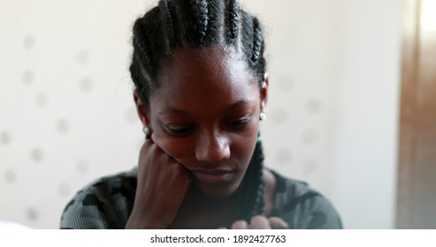 
Pensive Black Teen Girl Child Thinking. Thoughtful Sad Depressed Teenager Adolescent Girl