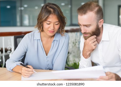 Pensive Business Experts Analyzing Marketing Report Stock Photo (Edit ...