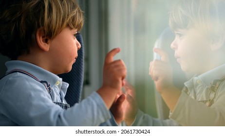 Pensive Child Daydreaming Inside Train Looking Out Wagon Window