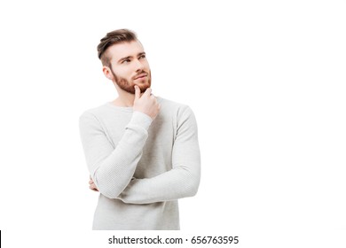 Pensive Curious Man Looking Up In Thinking Pose Trying To Make Choice Or Decision Isolated