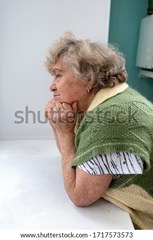 Similar – Image, Stock Photo Senior woman in a wheelchair alone in a room