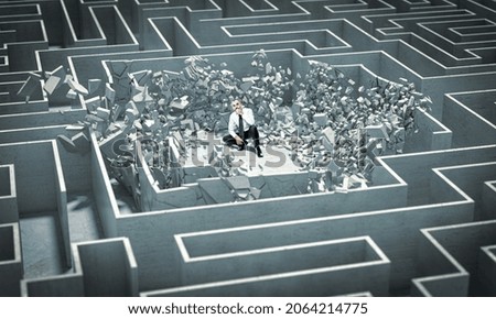 pensive man inside a destroyed labyrinth. concept of solution to a complex problem