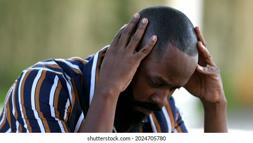 Pensive Preoccupied Black African Person Seeking Solution.