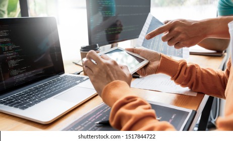 Pensive programmer working on on desktop pc programming code technologies or website design at office Software Development Company.