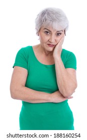 Pensive And Sad Older Woman Isolated On White.