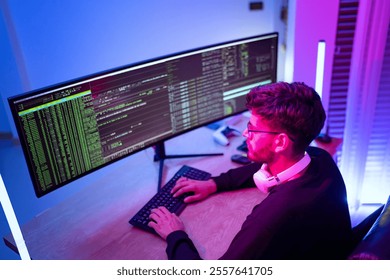Pensive software developer searching way to fix bugs in programming code