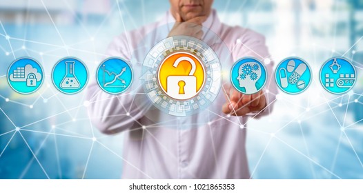 Pensive Unrecognizable Scientist In Pharmaceutical Industry Is Safeguarding Drug Quality Via Technology. Concept For Good Manufacturing Practice, GMP Regulatory Compliance And Data Integrity Risk.