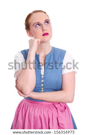  Pensive young girl - isolated in a dirndl