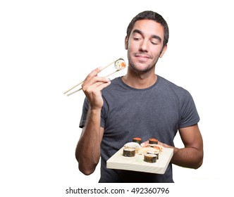 Pensive Young Man Eating Sushi