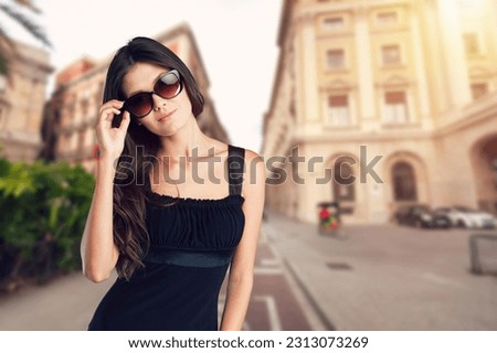 Pensive young woman posing outdoor