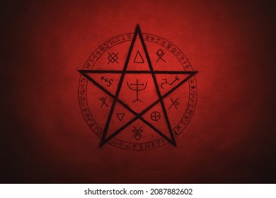 Pentagram symbol painted on paper with black paint. Occult and esoteric symbols. Spell or black magic ritual. Red color. - Shutterstock ID 2087882602