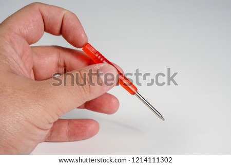 Pentalobe security screwdriver to open up electronics item especially Apple iPhone