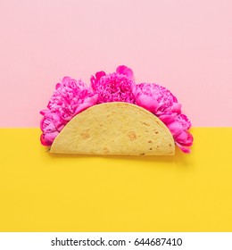 peonies in a cheese tortilla on yellow pink background.street fast food concept.