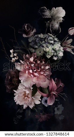 Peonies, hydrangea, lily, iris and tulips in bloom. Vintage bouquet of beautiful garden flowers on black. Floristic decoration. Floral background. Baroque style.