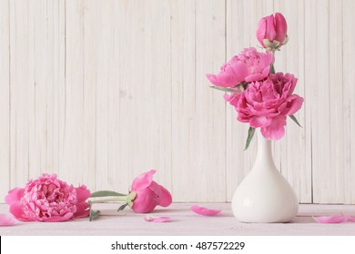 Peony Flowers In Vase On White Background